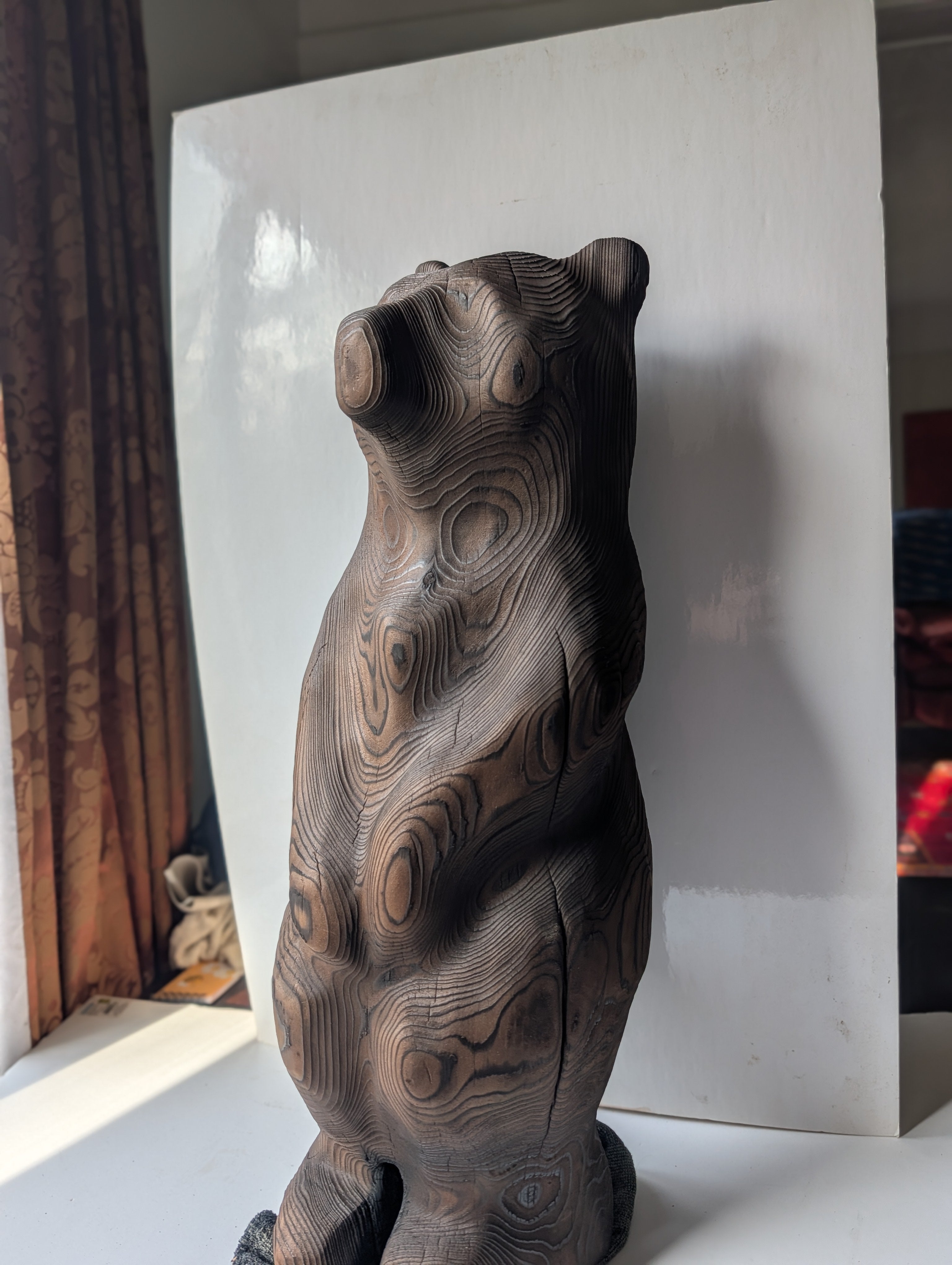Blackened bear standing