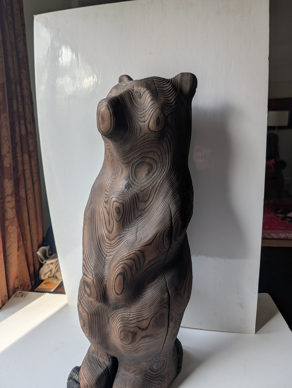 Blackened bear standing