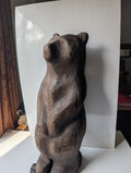 Blackened bear standing