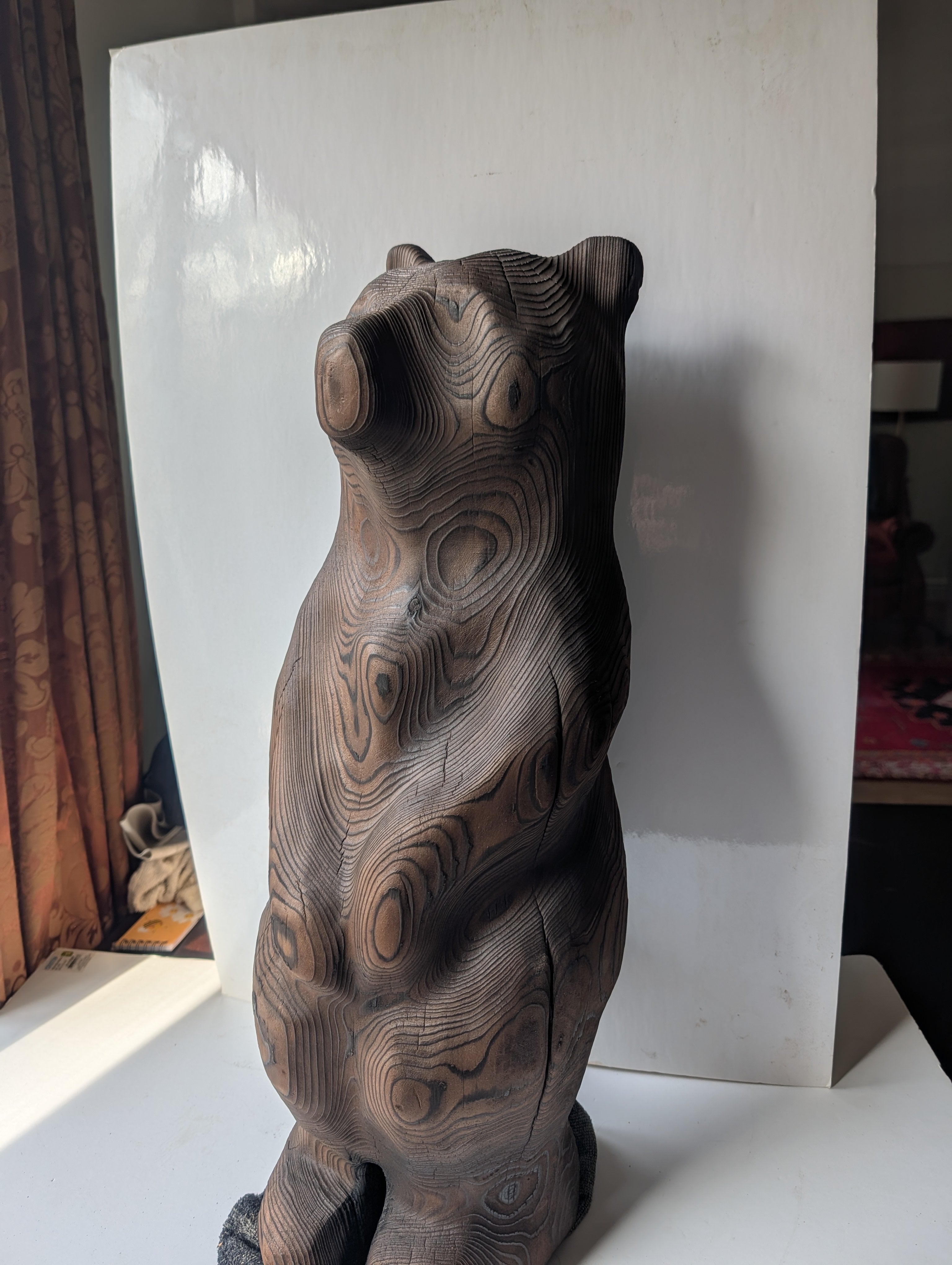 Blackened bear standing