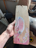 Octopus on a driftwood plank